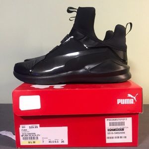 Puma. Size 9 1/2. Black